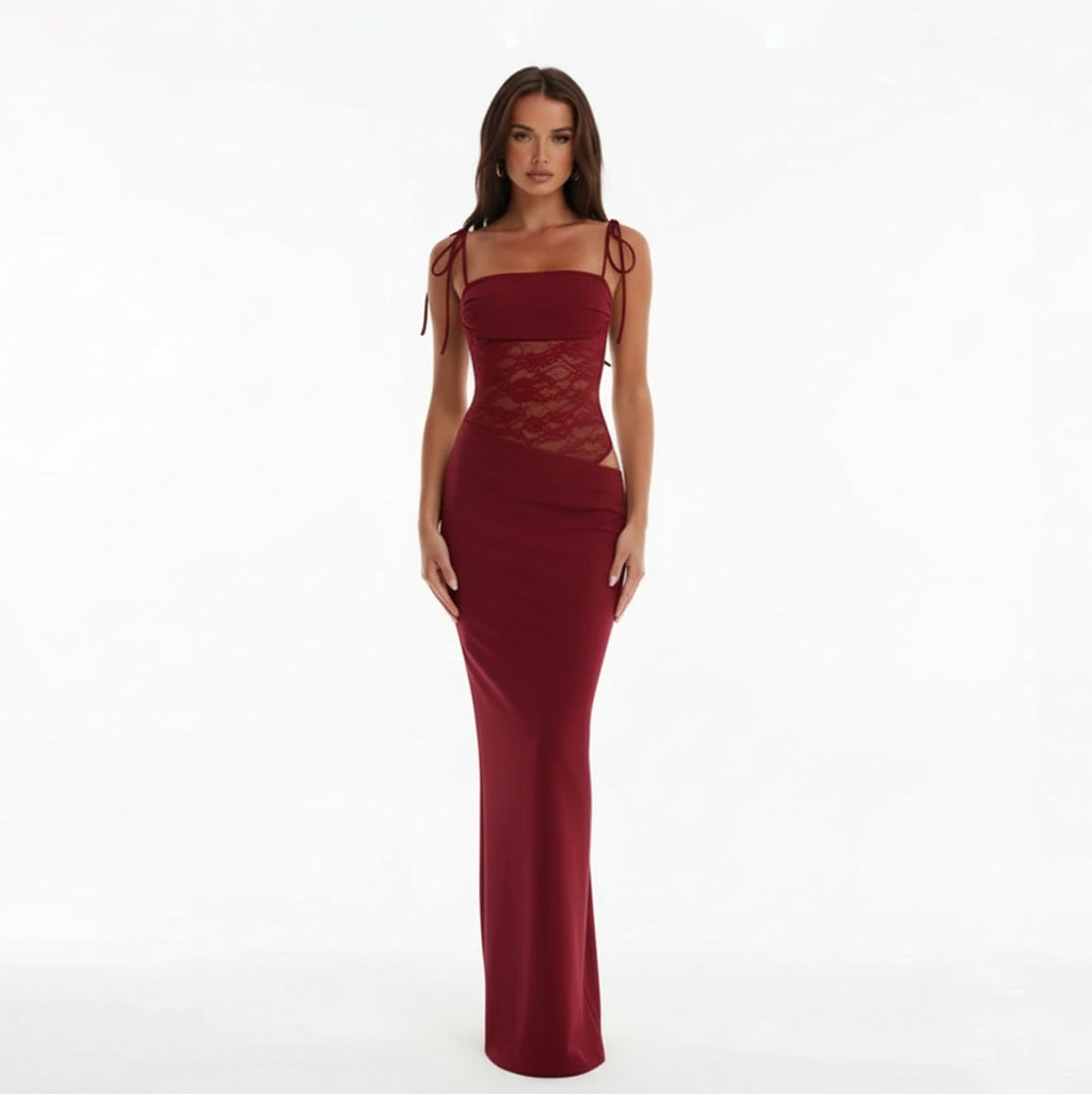 Woman wearing a Claret evening gown with lace detailing on a white background