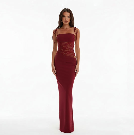 Woman wearing a Claret evening gown with lace detailing on a white background
