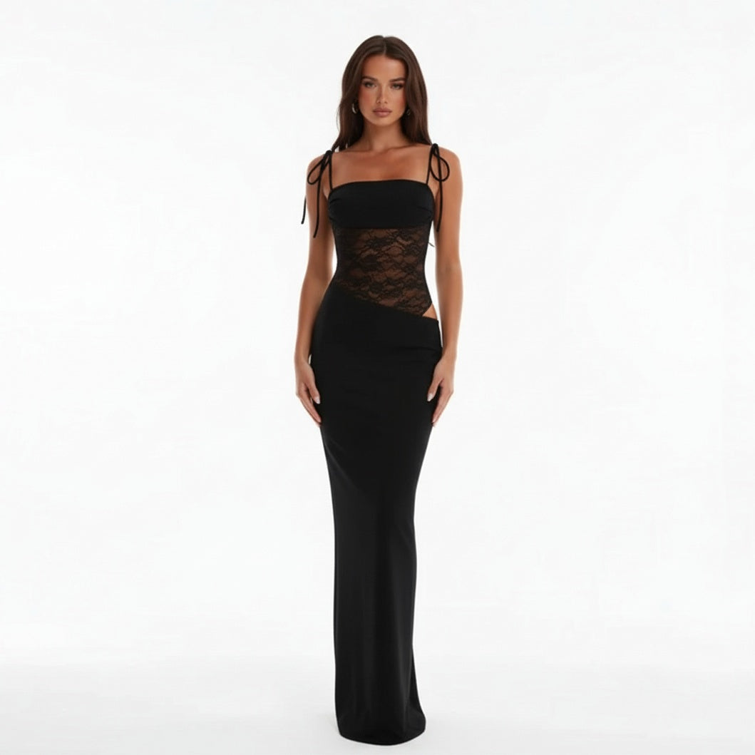 Woman wearing a Black evening gown with lace detailing on a white background